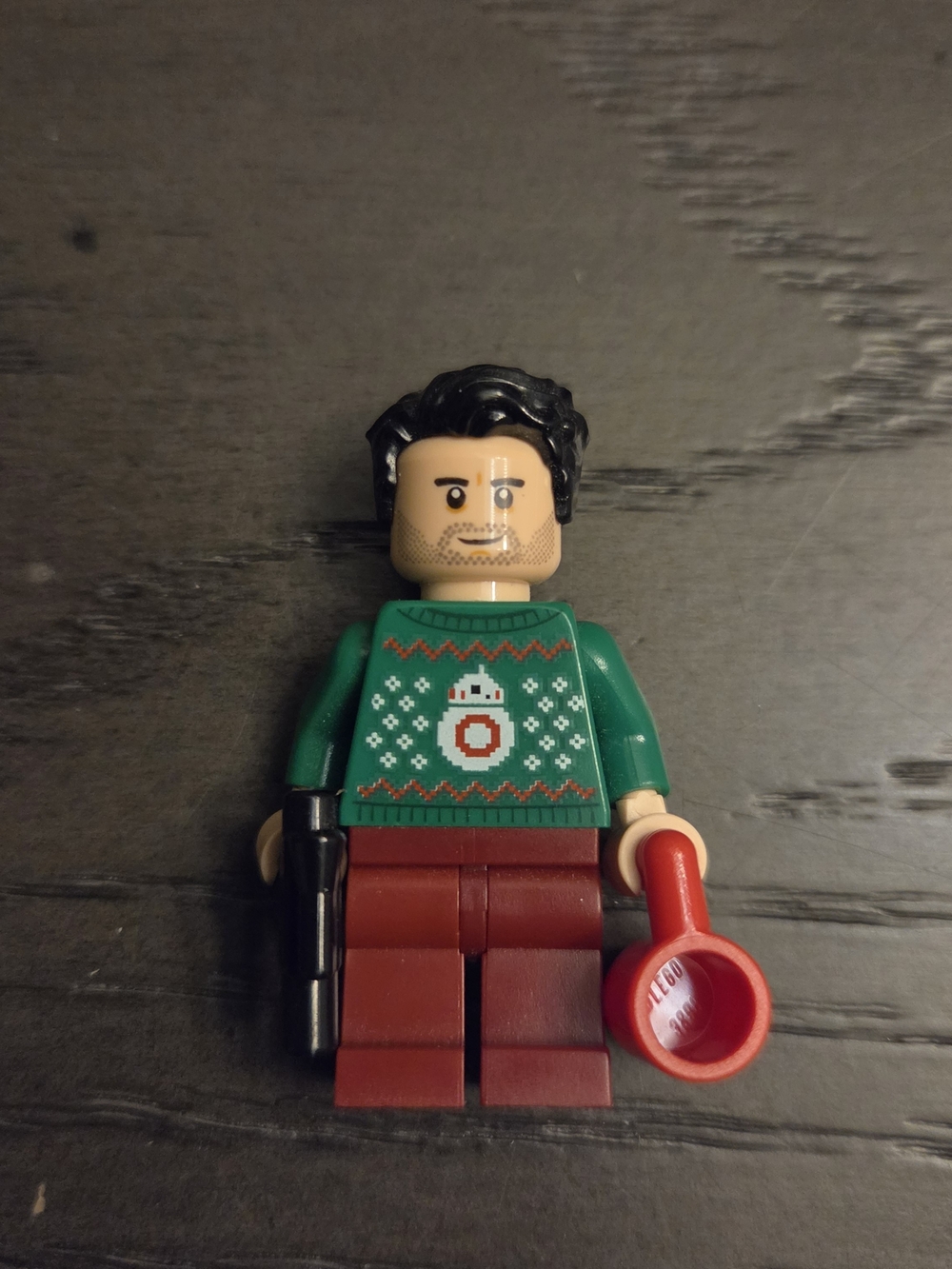 LEGO Star Wars Poe Dameron Minifigure (sw1117) wearing a green holiday sweater w